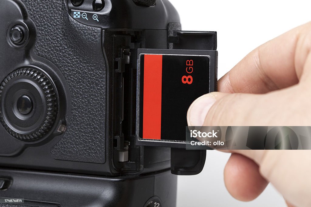 Using a compact flash memory card Byte Stock Photo