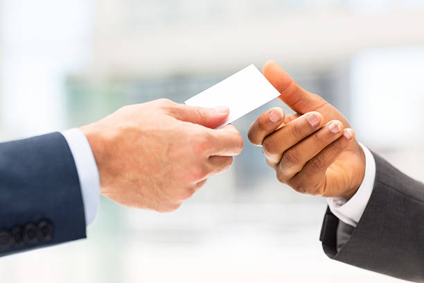 istock Businessman Giving Business Card To Client 174877102