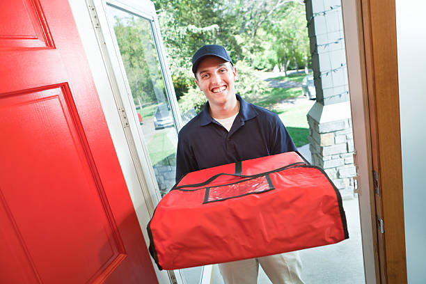 istock Take-out Pizza Delivery Service Arriving at Customer's Home 174877203