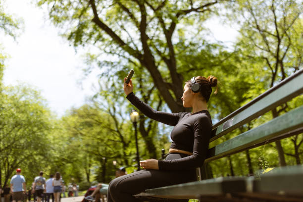 istock Multiracial girl jogging in Central Park 1748772435