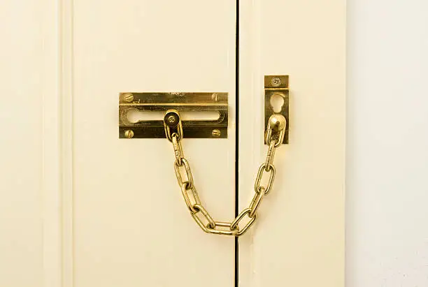 Photo of Brass chain door lock