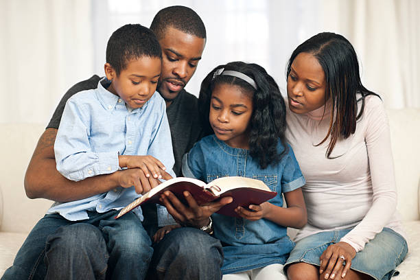 istock Family with the Bible. 174877569