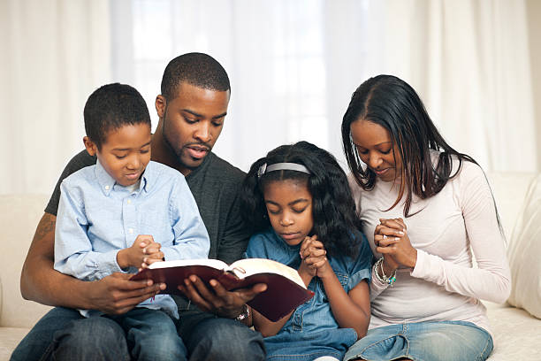 istock Family with the Bible. 174877571