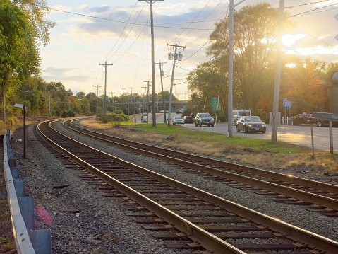 North Andover, Massachusetts - USA, October 19, 2023. Parallel tracks at the Sutton street rail crossing in North Andover Massachusetts.