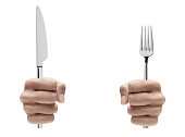 Hands Holding Fork and Knife