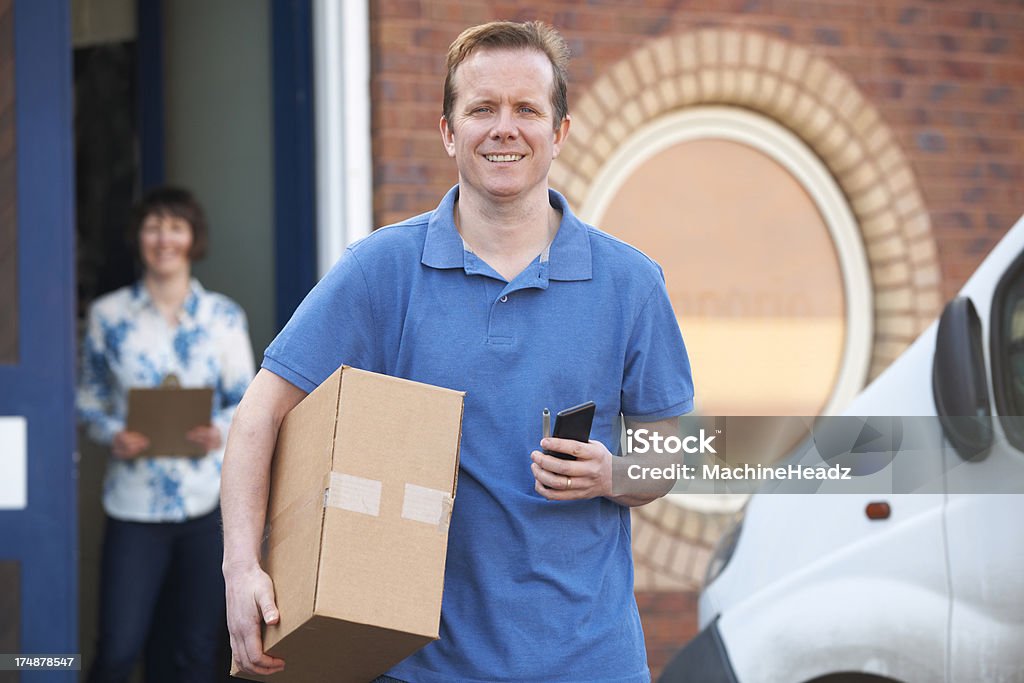 Making Delivery Courier Making Delivery To Client Office Stock Photo - Download Image ...
