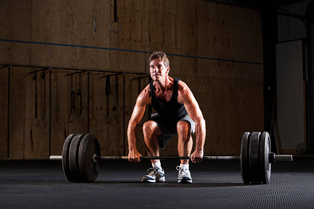 istock Man preparing to do deadlift 174879296