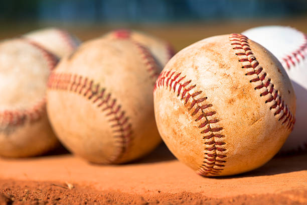 istock Youth League Baseballs on Pitching Mound Close Up 174879351
