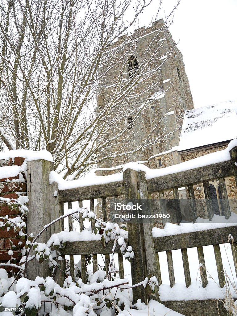 Winter church scene. "St Andrew's church is situated a little way out of the village of Belchamp St Paul, on the Essex Suffolk border, eastern England, UK. The structure of the church is mainly 15th century." British Culture Stock Photo