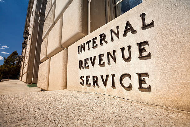 IRS Building in Washington Internal Revenue Service federal building Washington DC USA bringing home the bacon stock pictures, royalty-free photos & images