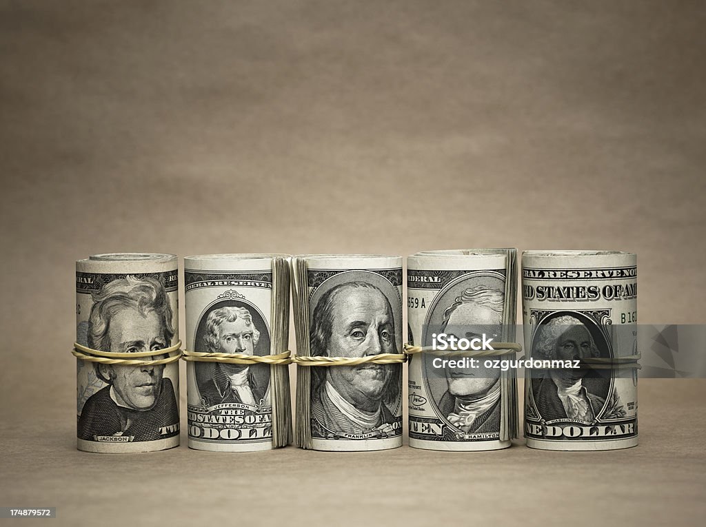 Noi banconote ripiegate - Foto stock royalty-free di Abbondanza