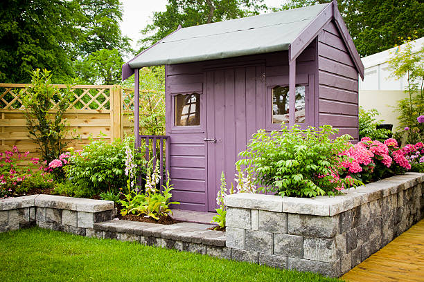 Garden shed Garden shed in summer outdoor shed stock pictures, royalty-free photos & images