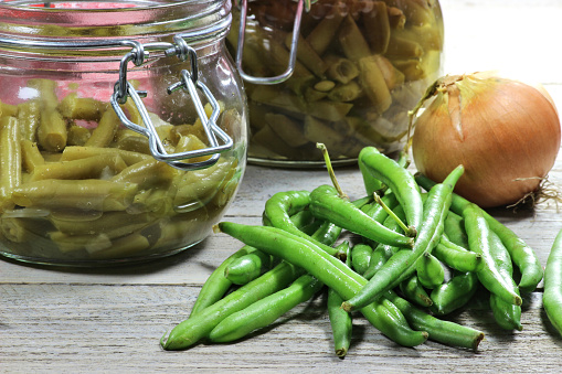 home canned green beans on wooden table