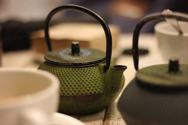 istock Green and blue teapots in tea shop 1748830815