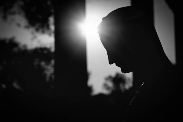 A silhouette of statue of Mary on the grounds of a church in El Paso, Texas.