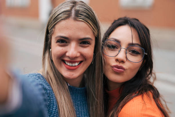 istock Two female friends taking selfie 1748918720