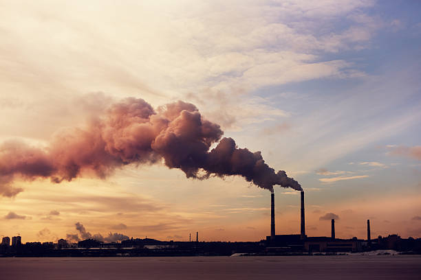 centrale électrique silhouette - pollution photos et images de collection