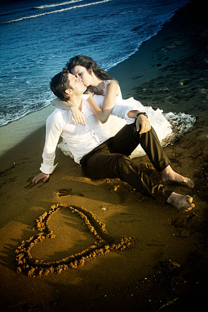 istock Newlywed couple on the coastline 174893774