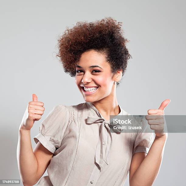 Happy Teen Girl With Thumbs Up Stock Photo - Download Image Now - Yes - Single Word, Ethnicity, One Person