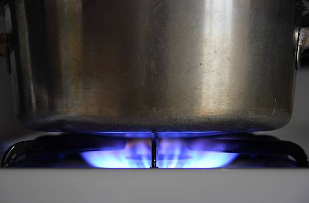 istock Pot Cooking over Gas Stove Flame 174893892