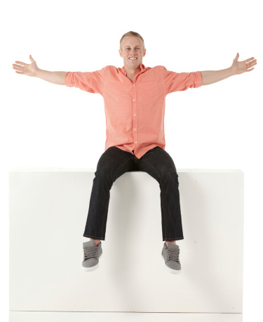 Man sitting on the ledge with arms outstretchedhttp://www.twodozendesign.info/i/1.png