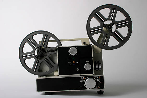 Home movie  projector An old model of a 8mm home movie projector vintage movie projector stock pictures, royalty-free photos & images