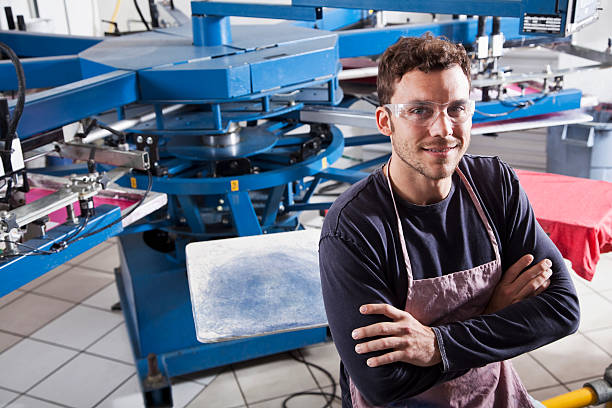 istock Man in screen printing business 174895928