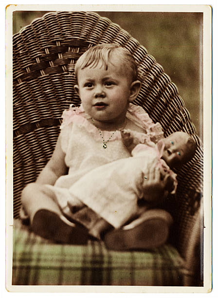 istock Lil Girl with Doll 174895965