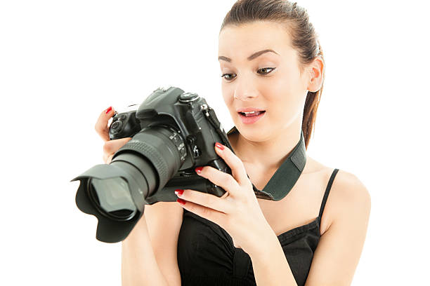 istock Young female photographer 174896009