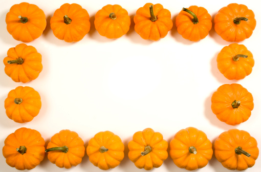 Subject: Pumpkins on all four sides of the frame on a white background for copy. Designed to be use as border for invitation, card, and layout for Thanksgiving, Halloween, and autumn festivities.