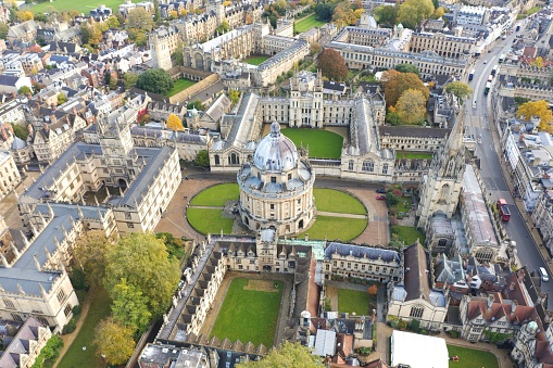 A breathtaking aerial view of the Radcliffe Camera, a signature architectural marvel of Oxford University. Surrounded by the historic and scholarly charm of Oxford's streets, colleges, and spires, this image captures the essence of academic excellence and British heritage.