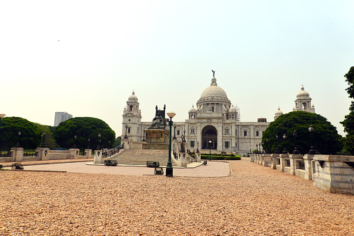The Victoria Memorial is a large marble building on the Maidan in Central Kolkata, having its entrance on the Queen's Way. It was built between 1906 and 1921 by the Government of India. It is dedicated to the memory of Victoria, Empress of India from 1876 to 1901.