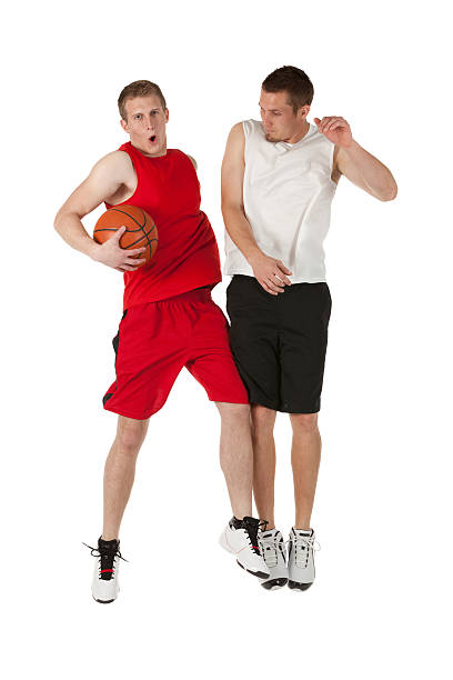 istock Two basketball players jumping and celebrating 174896105