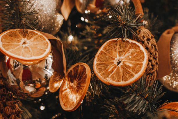 istock Christmas tree decorations made from dried sliced oranges and mandarins. 1748961126
