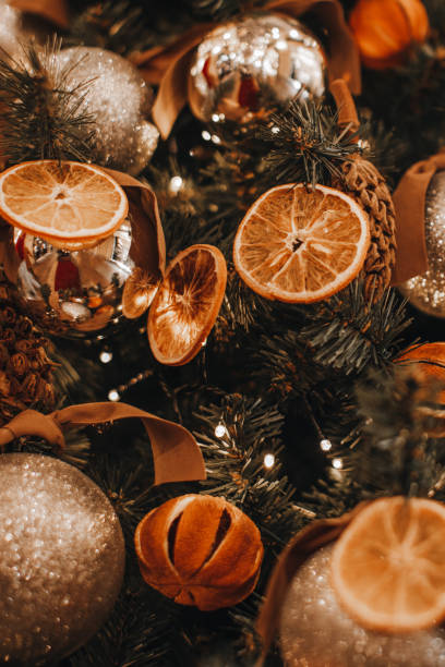 istock Christmas tree decorations made from dried sliced oranges and mandarins. 1748961635