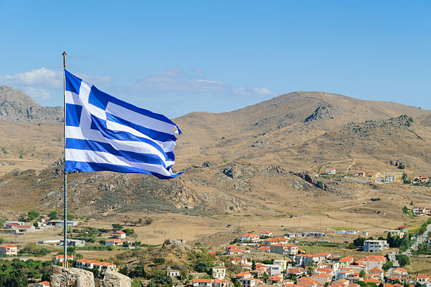 istock Greek Flag Flying over Town 174896463
