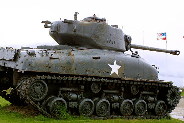 istock Sherman tank and U.S. flag 174897081