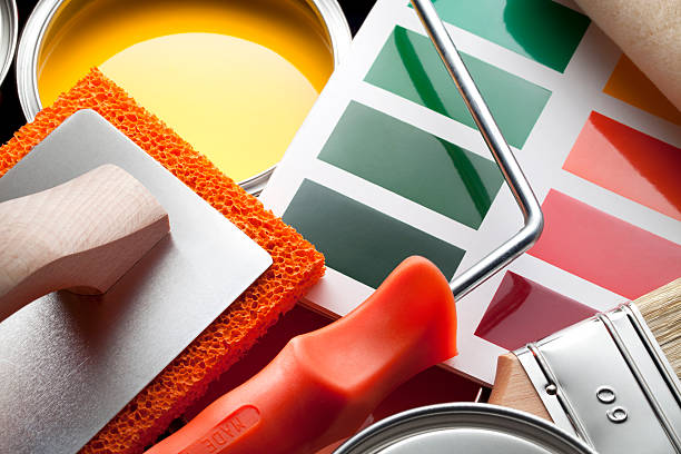 Paint color cards with decorating equipment