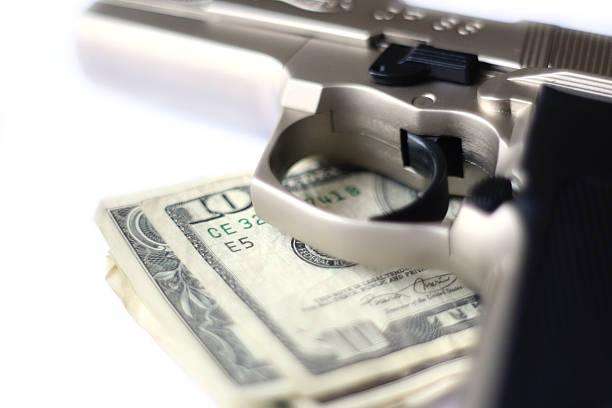 istock Guns and money 174897107