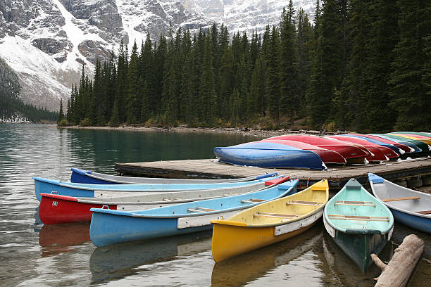 istock canoes - moraine lake 174897222