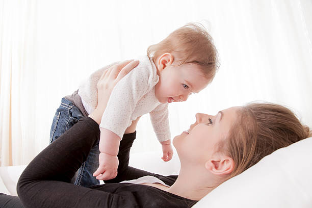 istock Daughter and young mother playing 174897303