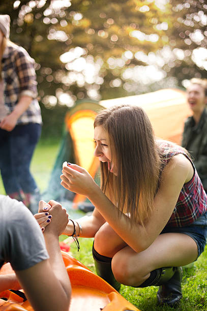 istock teenage camping fun 174897929