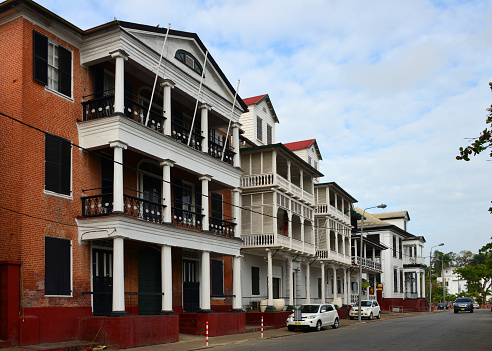 Paramaribo, Suriname: Waterkant (Waterfront) is the oldest street in Paramaribo, located on the Suriname River waterfront. Due to its iconic appearance, it forms a central part of the historic city center of Paramaribo, which has been protected by UNESCO as a World Heritage Site. Many of the original buildings were lost during the city fire of 1821 . After the fire, the architect Johan August Voigt gave Paramaribo a new cityscape by erecting an ensemble of monumental buildings on the Waterkant.