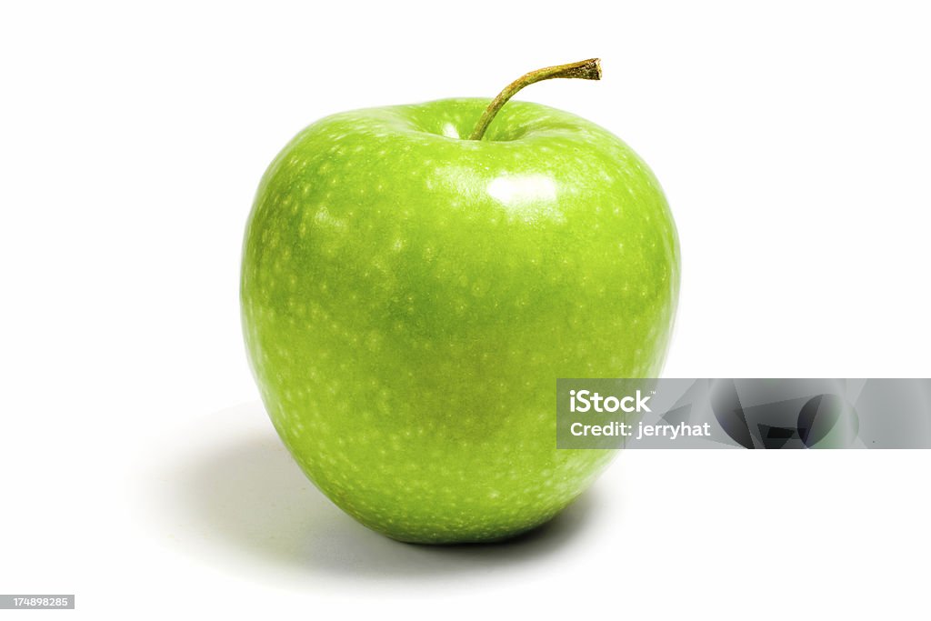Granny Smith Apple A crunchy Granny Smith apple. Apple - Fruit Stock Photo