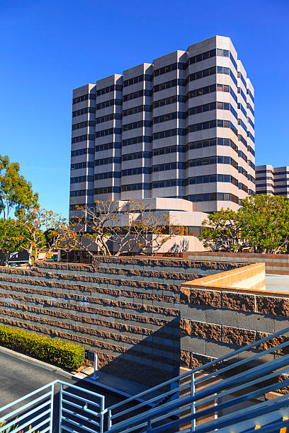 office building außenansicht - office building office park low angle view orange county stock-fotos und bilder