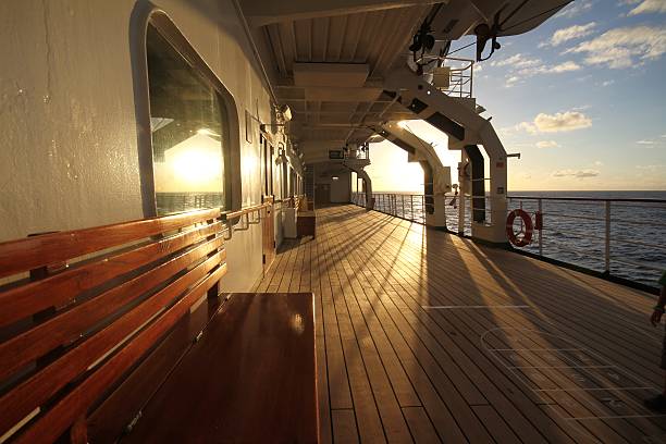 ship deck at sunset stock photo