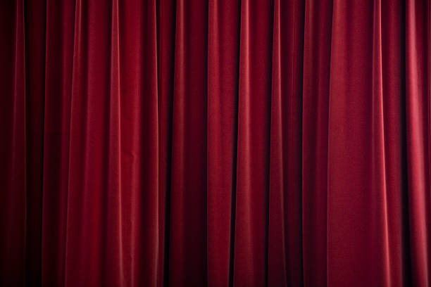 stage curtain red velvet stock photo