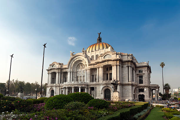 Palace of Fine Arts in Mexico City "Palacio de Bellas Artes (Spanish for Palace of Fine Arts). Mexico City's main opera and theatre house. A extravagant marble neoclassical structure inaugurated in 1934. Mexico City, Mexico." mexico city stock pictures, royalty-free photos & images