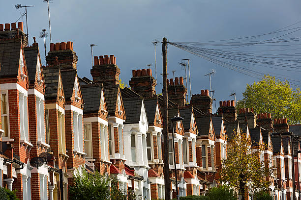 Typical terraced houses Typical Victorian terraced houses in SW London. window chimney london england residential district stock pictures, royalty-free photos & images
