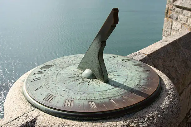 "The shadow of the sun reveals the time on an ancient sundial on the castle walls of Saint Michael's Mount, Cornwall, England.For more in this series, please see:"